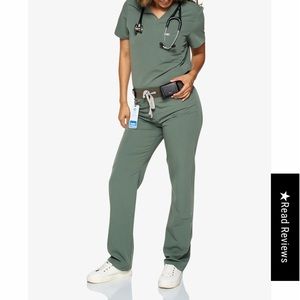Code Nxt scrubs top is a size S bottoms size M